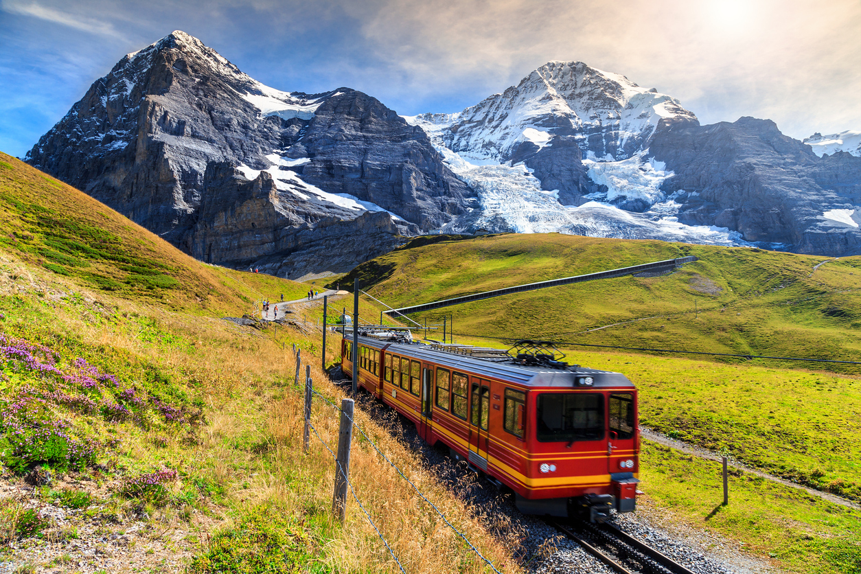 Virtual Train Rides – Famous electric red tourist train coming down from the Jungfraujoch station(top of Europe) in Kleine Scheidegg. Virtual Train Rides - Famous electric red tourist train coming down from the Jungfraujoch station(top of Europe) in Kleine Scheidegg.