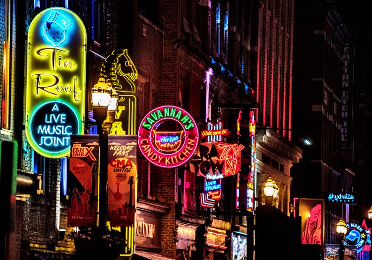 A street view of downtown Nashville, TN at night.