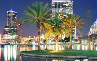 Nighttime view of the Orlando, FL skyline.